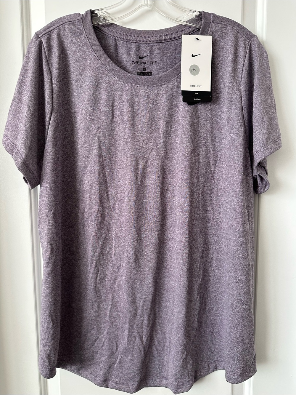 4 Nike woman’s Dri-FIT Short Sleeve Tee